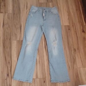 J1 - Light Blue Distressed Women Jeans. Size L